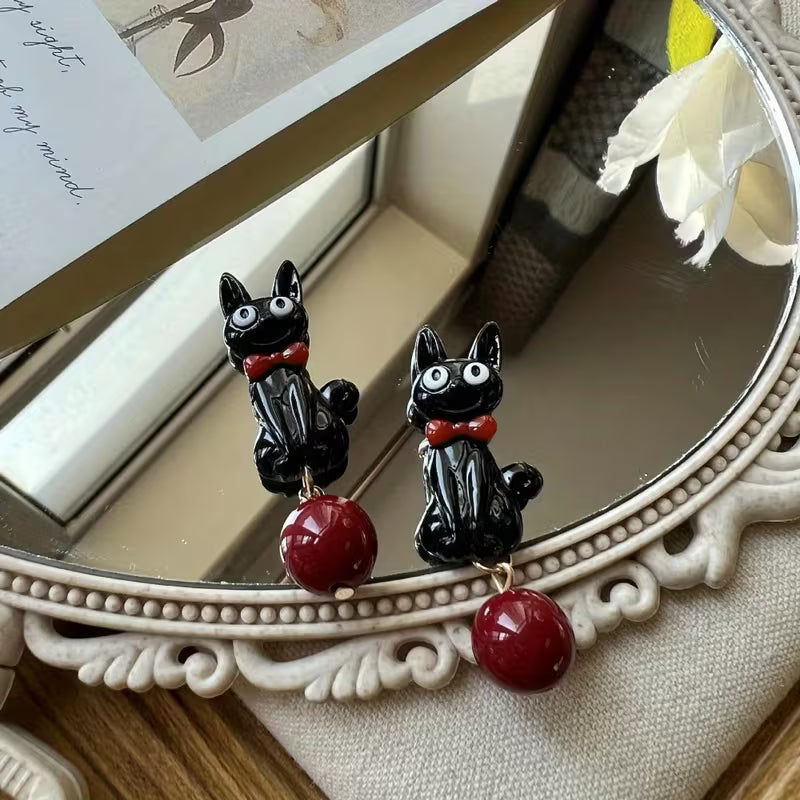 2x Aretes de Gato Negro con perla roja