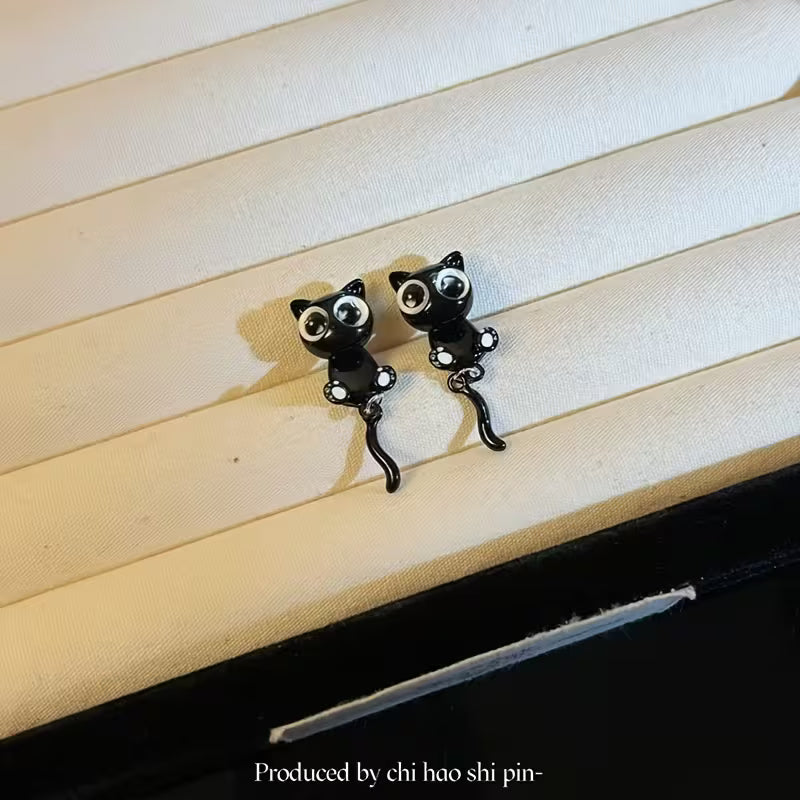 Aretes de Gatido negro con ojotes 2x
