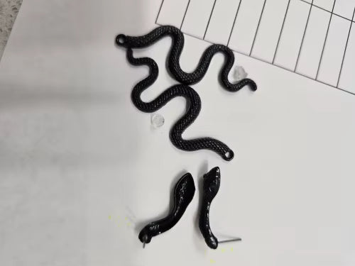 2x Aretes de Serpientes Negras