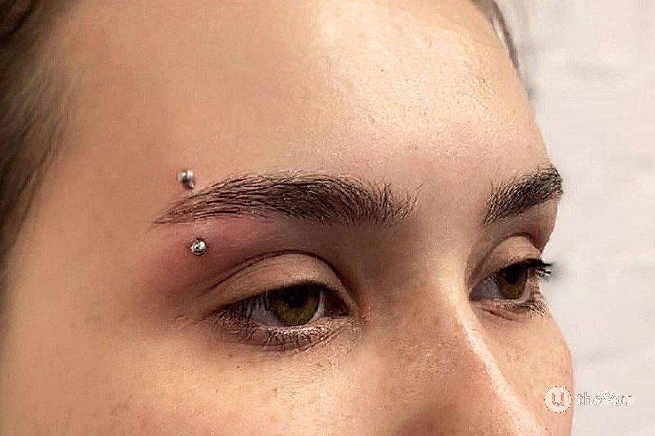 1x Piercing para ceja plateado