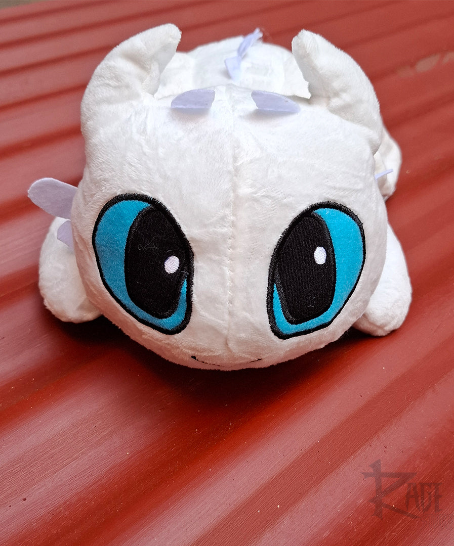 Peluche de Furia Luminosa acostada - Cómo entrenar a tu Dragón