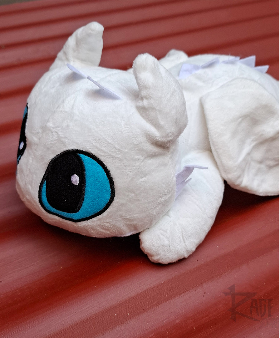Peluche de Furia Luminosa acostada - Cómo entrenar a tu Dragón